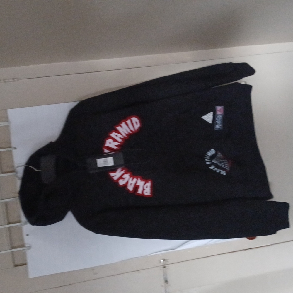 Black pyramid sweater